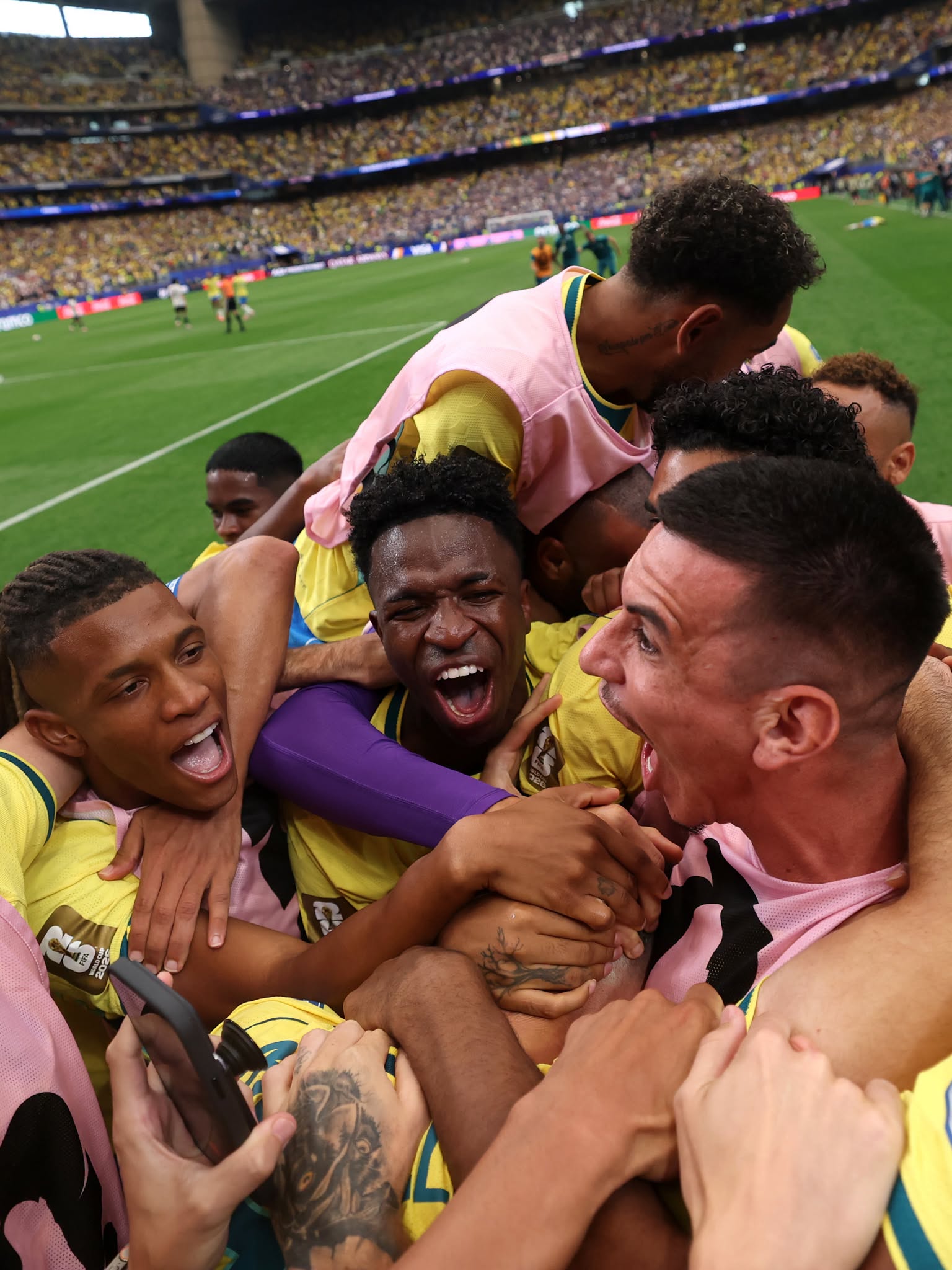 HOUSTON, TEXAS - JUNE 29: Gabriel Martinelli #22 of Brazil celebrates with teammates after scoring the team's second goal during the FIFA World Cup 2026 Round Of 32 match between Brazil and Japan at Houston Stadium on June 29, 2026 in Houston, Texas. (Photo by Lars Baron/Getty Images)