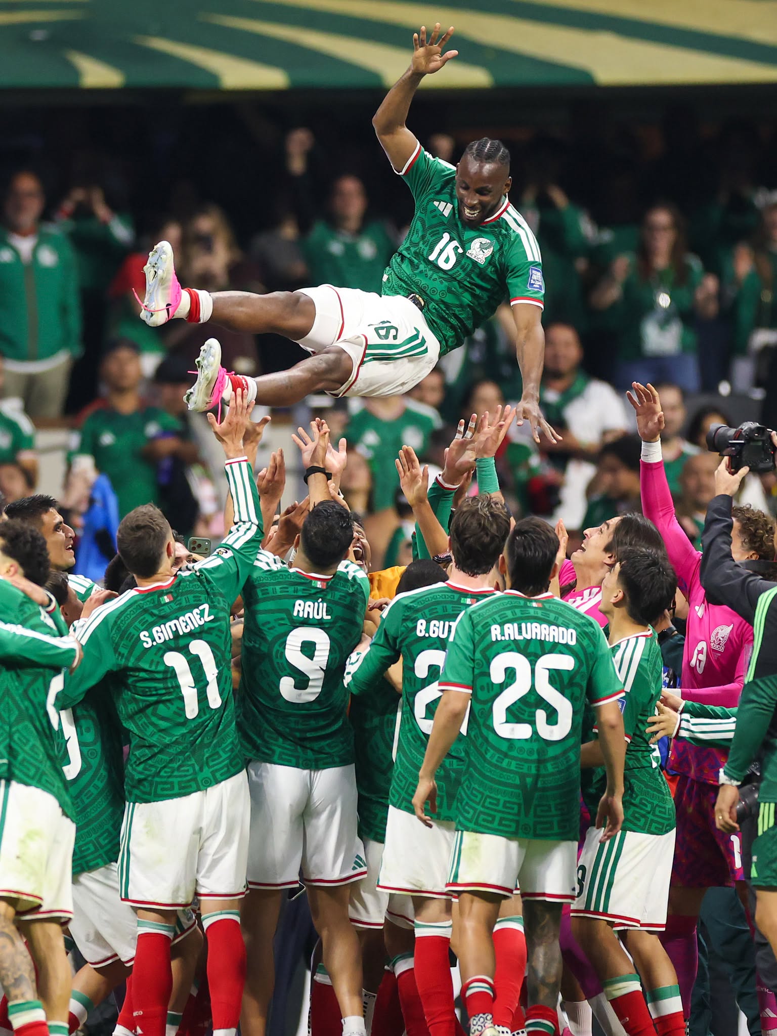 MEXICO CITY, MEXICO - JUNE 30: Julian Quinones #16 of Mexico is thrown in the air by team mates as they celebrate after the team's victory and progression to the Round of 16 after the FIFA World Cup 2026 Round Of 32 match between Mexico and Ecuador at Mexico City Stadium on June 30, 2026 in Mexico City, Mexico. (Photo by Kevin C. Cox/Getty Images)