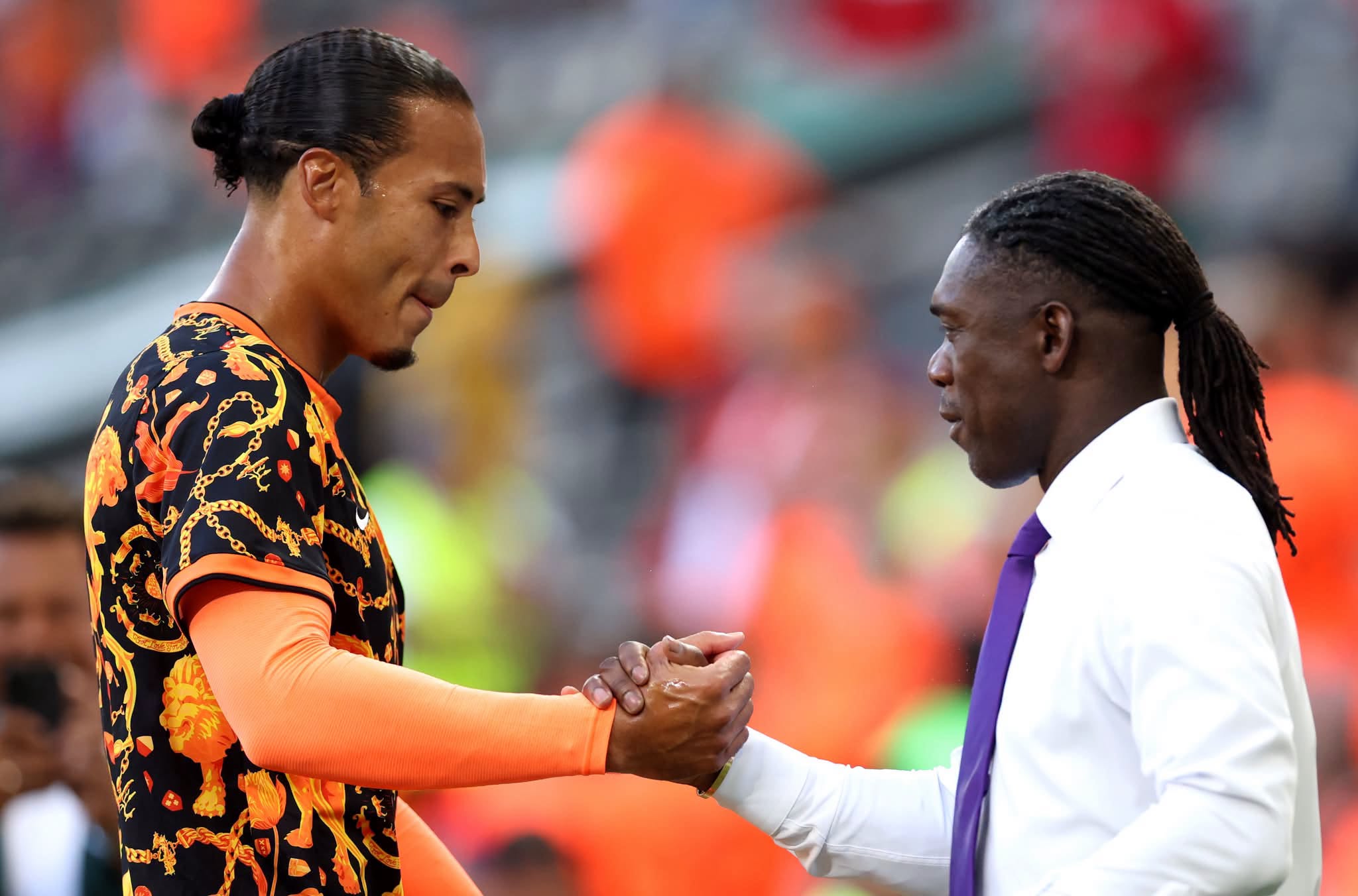 GUADALUPE, MEXICO - JUNE 29: Virgil van Dijk #4 of the Netherlands shakes hands with Clarence Seedorf before the FIFA World Cup 2026 Round of 32 match between Netherlands and Morocco at Monterrey Stadium on June 29, 2026 in Guadalupe, Mexico. (Photo by Carl Recine/Getty Images)
