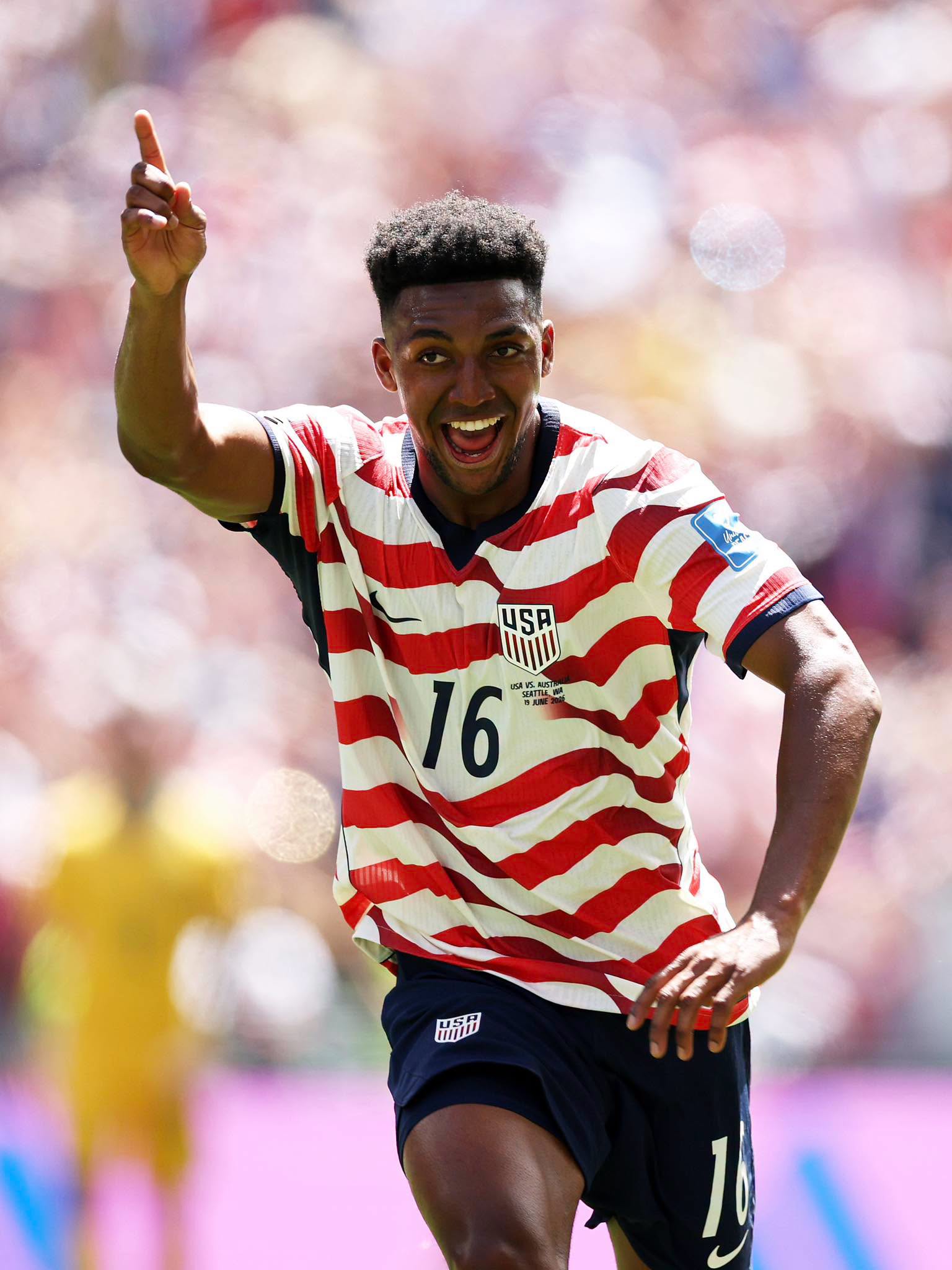 SEATTLE, WASHINGTON - JUNE 19: Alex Freeman #16 of the United States celebrates scoring his team's second goal during the FIFA World Cup 2026 Group D match between USA and Australia at Seattle Stadium on June 19, 2026 in Seattle, Washington. (Photo by Jared C. Tilton - FIFA/FIFA via Getty Images)