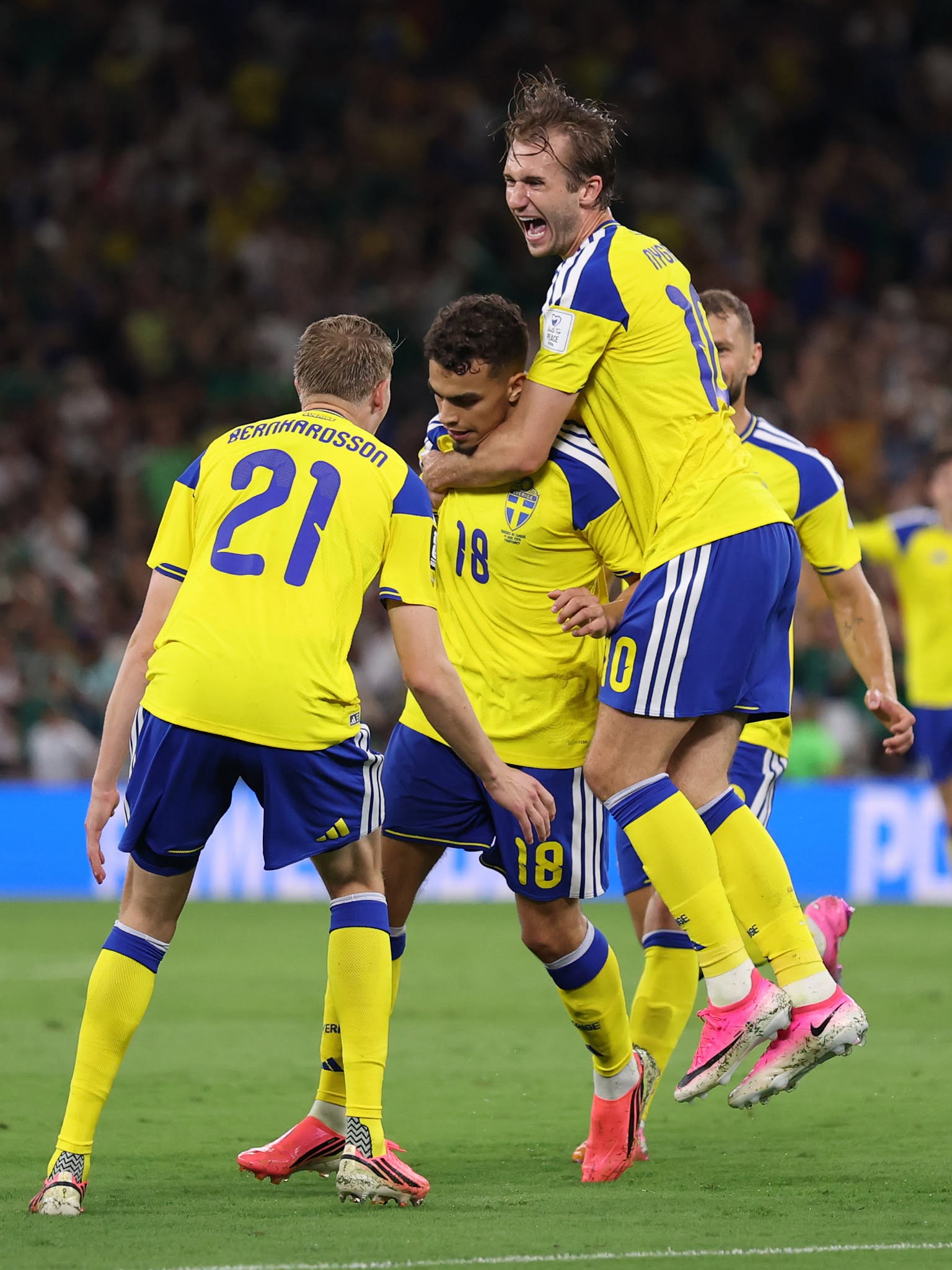 MONTERREY, MEXICO - JUNE 14: Yasin Ayari #18 of Sweden celebrates with teammates Alexander Bernhardsson #21 and Benjamin Nygren #10 after scoring his team's first goal during the FIFA World Cup 2026 Group F match between Sweden and Tunisia at Monterrey Stadium on June 14, 2026 in Monterrey, Mexico. (Photo by Luke Hales/Getty Images)