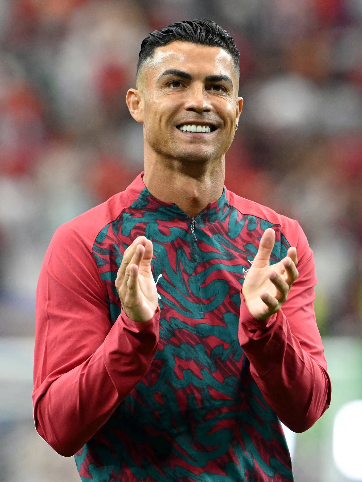 Portugal's forward #07 Cristiano Ronaldo acknowledges the crowd ahead of the 2026 World Cup round of 16 football match between Portugal and Spain at the Dallas Stadium in Arlington on July 6, 2026. (Photo by RONALDO SCHEMIDT / AFP via Getty Images)